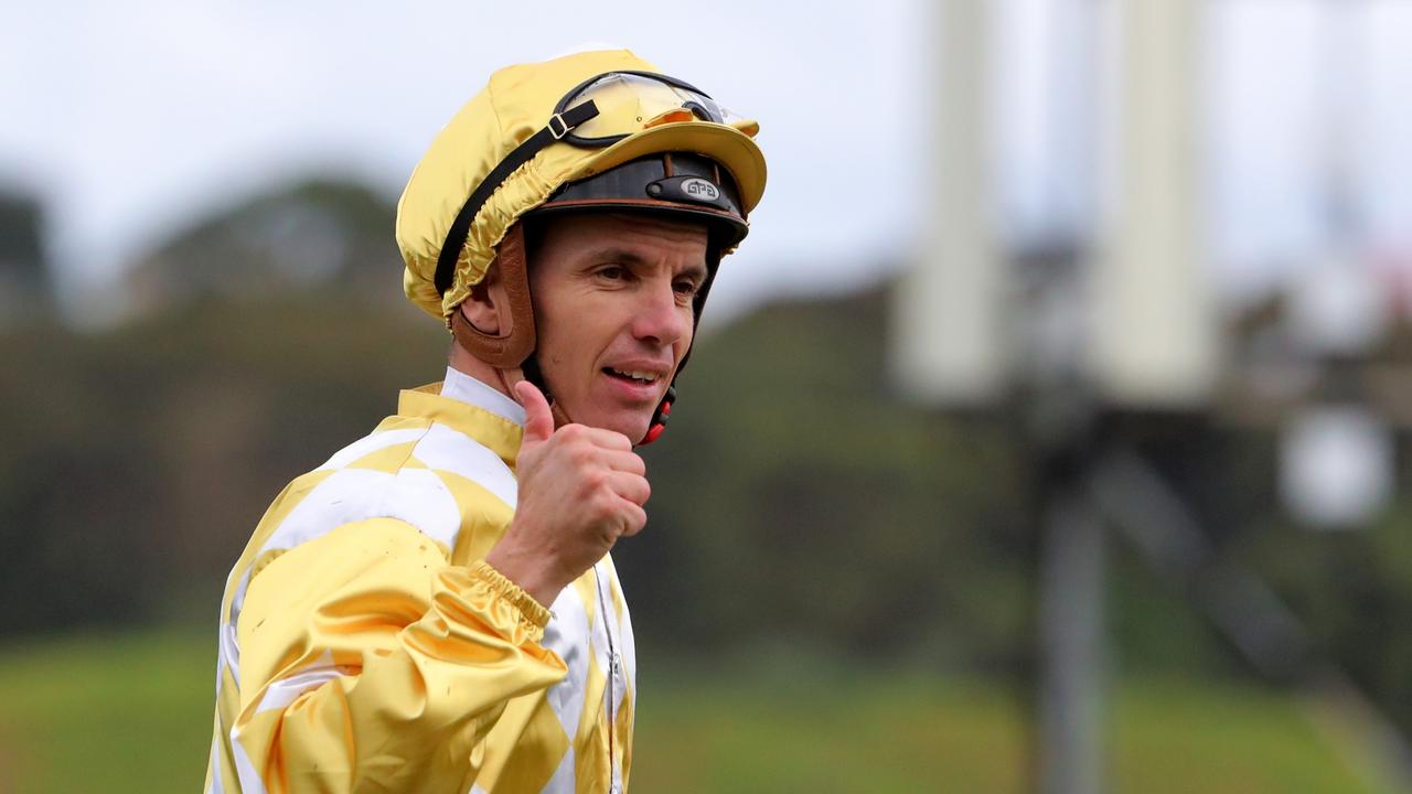 Thumbs up: Tim Clark lands the Australian Derby on Major Beel. Picture: Jeremy Ng–Getty Images