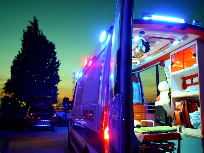 Emergency Ambulance at sunset istock