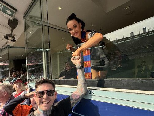 Launceston Mayor Matthew Garwood with Katy Perry at the 2024 AFL Grand Final who he invited to visit Tasmania now that she is a Tassie Devils supporter.  Picture: supplied