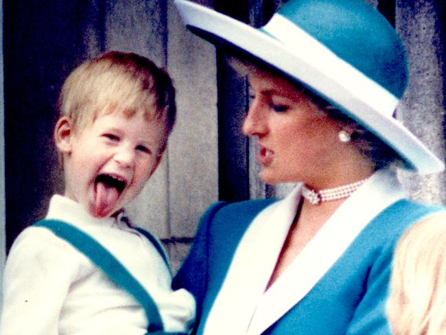 Princess Diana holds Prince Harry on the Palace Balcony in 1988. (AP Photo/Steve Holland)