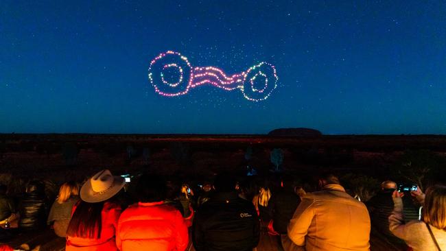 Wintjiri Wiru Songline Anangu share the Mala story, from Kaltukatjara to Uluru, through a drone, sound and light show designed and produced by RAMUS. Photo: Getty Images