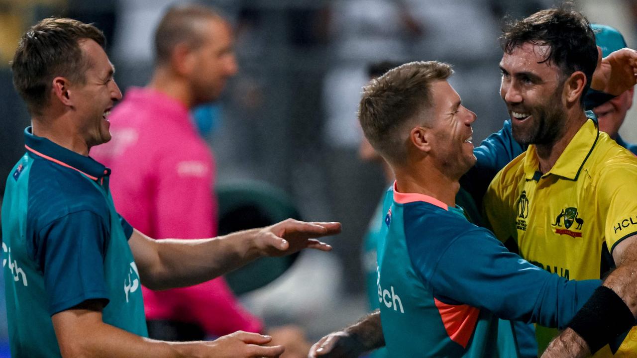 Glenn Maxwell (R) celebrates with David Warner and Marnus Labuschagne after his innings. Picture: Indranil Mukherjee / AFP