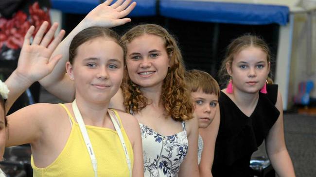 CQUni's December 4 morning graduation ceremony: Shaelin, Zaliah, Myles and Tauri Chapman spot graduate Mum across the auditorium. Picture: Jann Houley