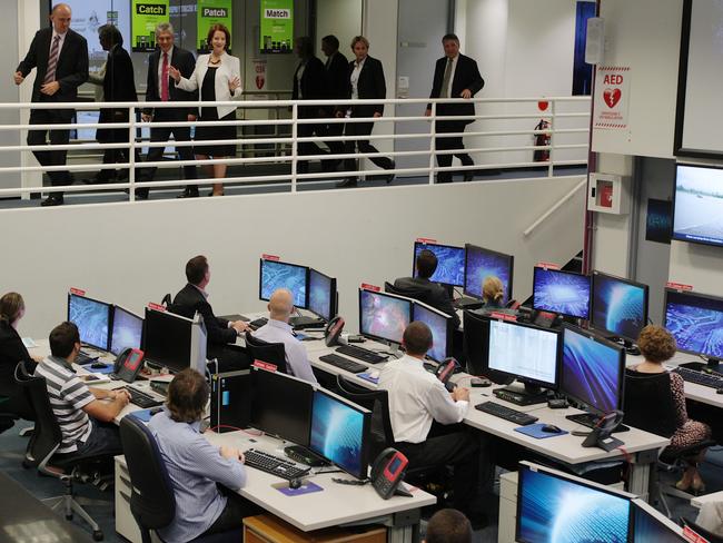 PM Julia Gillard tours ‘The Pit’ at Canberra's Defence Signals Directorate in 2013. Picture: Alex Ellinghausen