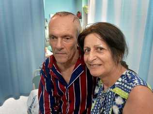 Former Coolum man Steve Nichol is recovering in a Brisbane hospital after a brain operation. Steve is comforted by his wife Angie. Picture: Warren Lynam