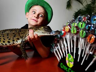 7 year old entrepreneur Angus Walters is taking Darwin by storm with his 'Croc Candy' lollies which will be available at the Croc Cove gift area. 
Picture: Justin Kennedy