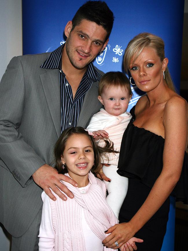 Brendan and Alex Fevola with Mia, 7, and Leni, 10 months.