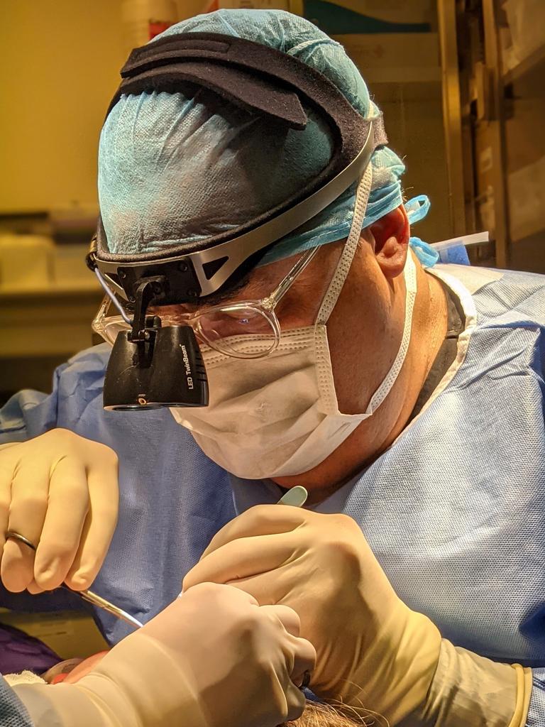 Dr Thomas Romo at work on Conrado’s nose. Picture: Supplied.