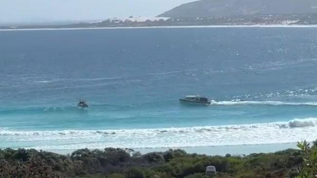 Witnesses have recounted the horrific moment a surfer was mauled by a shark off a remote beach in Western Australia, while his partner watched on. Picture: 9News