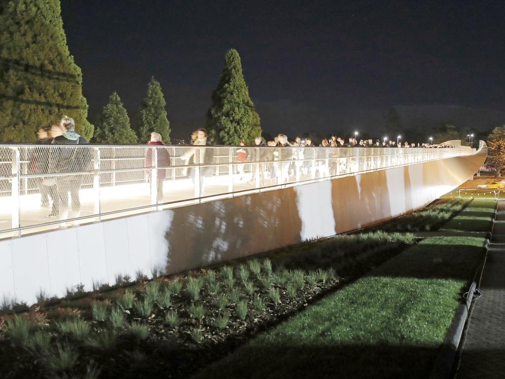 Crowds cross Hobart's new Remembrance Bridge to get to the Anzac Day dawn service at the Hobart cenotaph. Picture: PATRICK GEE