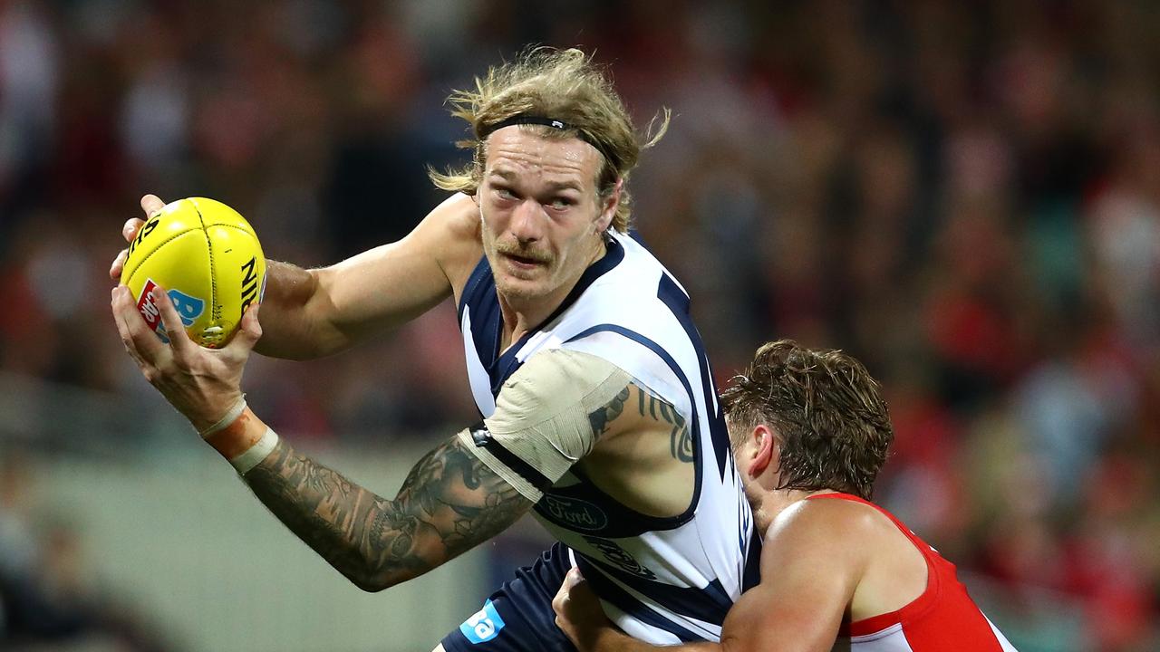 Tom Stewart gets a handball against Sydney earlier this season.