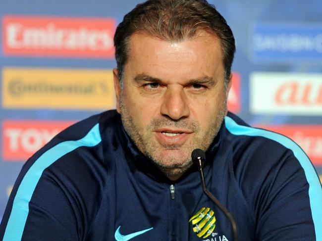 Socceroos coach Ange Postecoglou and Mile Jedinak attend a pre-match press conference in Melbourne, Monday, Oct. 10, 2016. The Socceroos will play Japan in a World Cup qualifier at Etihad stadium tomorrow. (AAP Image/Joe Castro) NO ARCHIVING