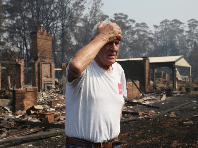 January 2020: Frank surveys the damage to his property and livelihood. Picture: David Swift