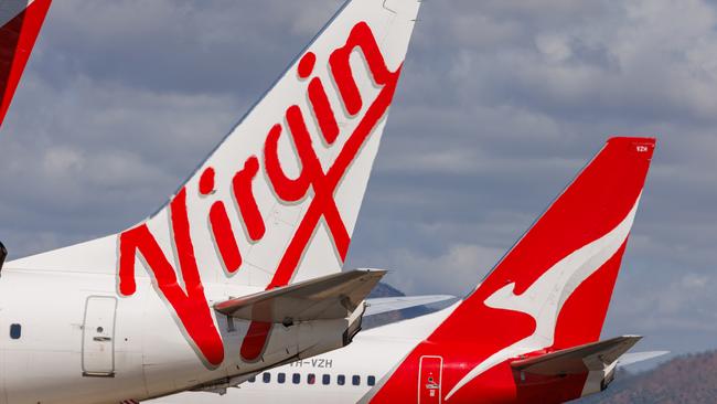 Townsville, Queensland - 28 July 2021: Virgin Australia and Qantas tails on display at Townsville Airport in far North Queensland27 October 2024Kendall HillPhoto - Getty Images