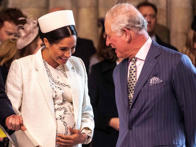 Britain's Meghan, Duchess of Sussex (2R) talks with Britain's Prince Charles, Prince of Wales (R) as Britain's Prince William, Duke of Cambridge, (L) talks with Britain's Prince Harry, Duke of Sussex, (2L) as they all attend the Commonwealth Day service at Westminster Abbey in London on March 11, 2019. - Britain's Queen Elizabeth II has been the Head of the Commonwealth throughout her reign. Organised by the Royal Commonwealth Society, the Service is the largest annual inter-faith gathering in the United Kingdom. (Photo by Richard Pohle / POOL / AFP)