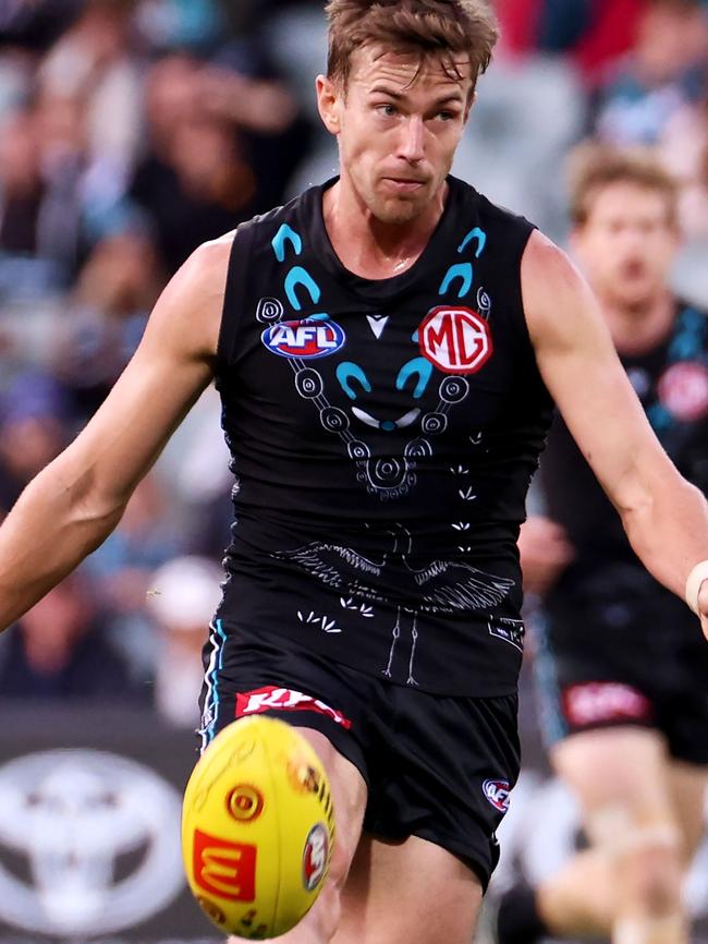 Trent Dumont and his Port Adelaide teammates will need at least 11 or 12 wins to lock in a finals appearance.