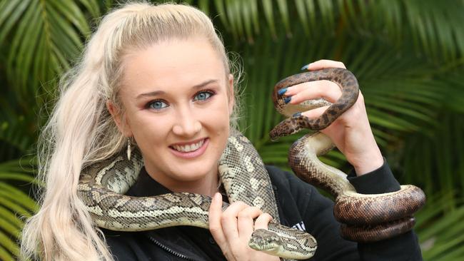 Local snake catcher Katie Eales of Wild Encounters with Jetson the Carpet Python and Spot the Spotted Python. Picture Mike Batterham