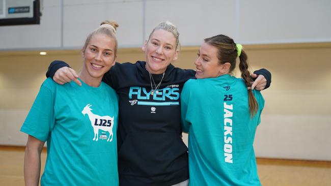 Lauren Jackson with Southside Flyers teammates Abby Bishop and Sara Blicavs ahead of her return to the WNBL against Adelaide on Saturday night