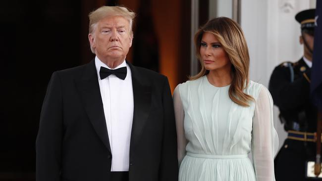 US President Donald Trump and first lady Melania Trump wait to welcome Australian Prime Minister Scott Morrison and his wife Jenny for a state dinner at the White House on Saturday.