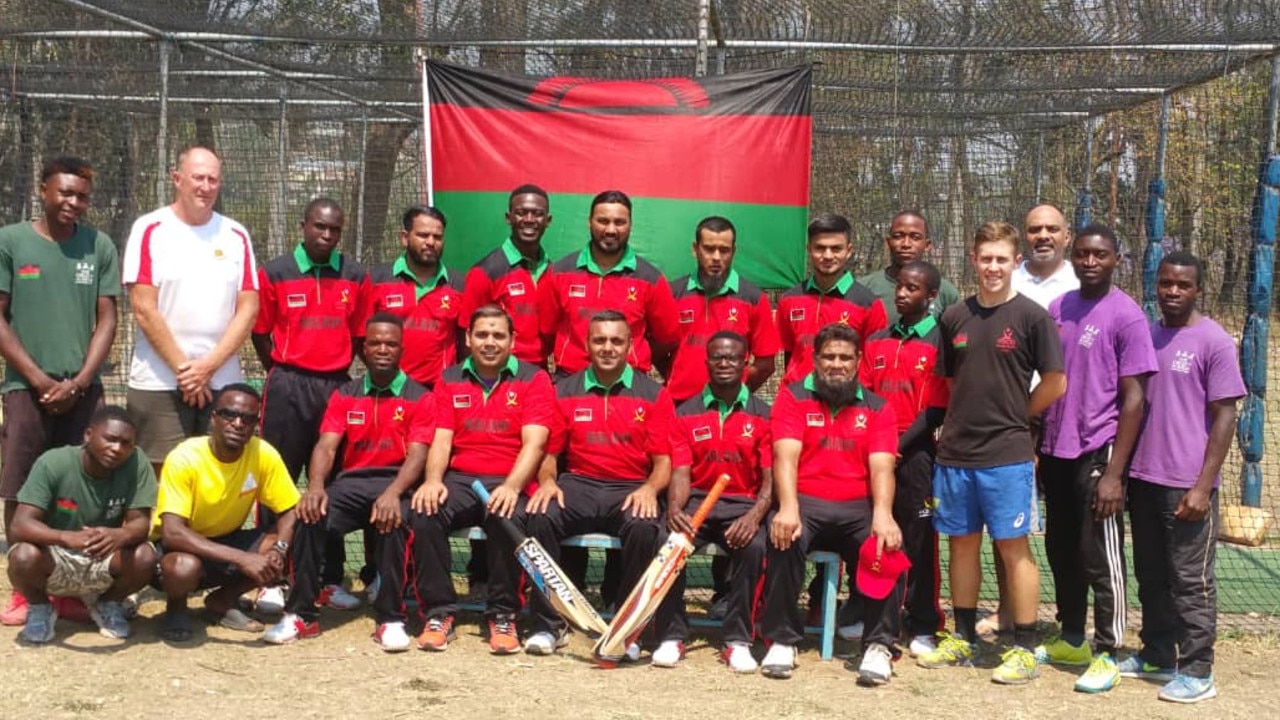 Reegan Brown (right, front) with the Malawi men's national team.