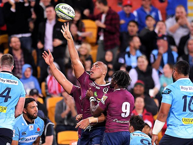 Caleb Timu (C) celebrates after scoring a powerful try against the Tahs.