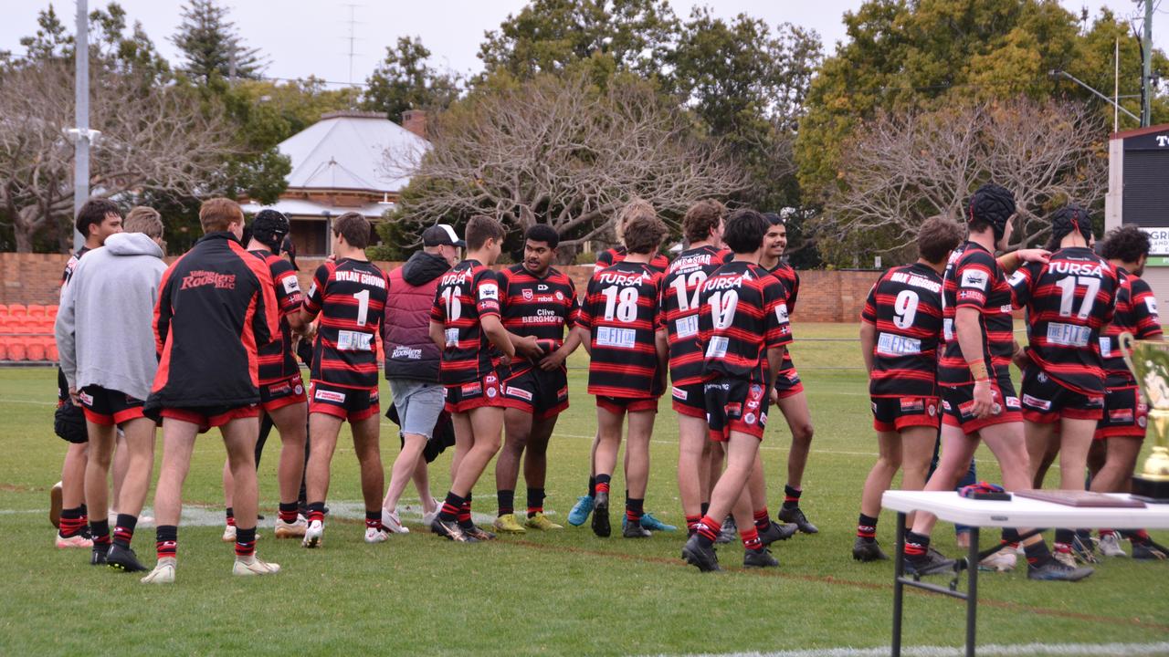 Valleys Roosters under-19's waiting for the trophy presentation post match.