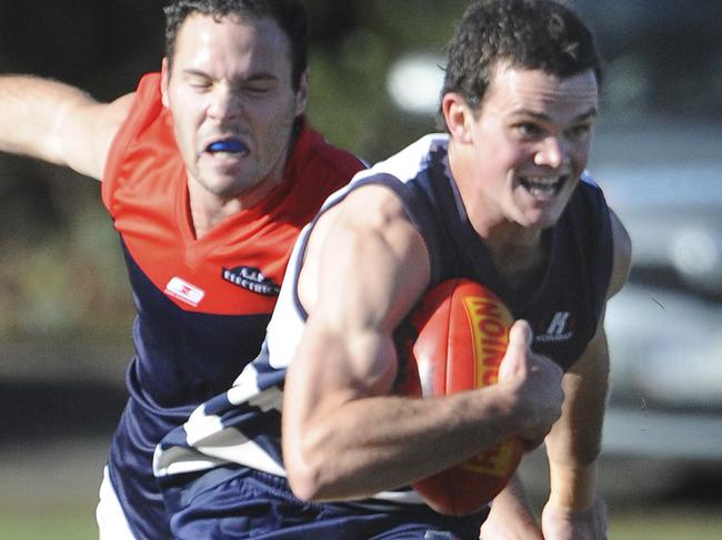 A young James Wright with the ball for Macedon.