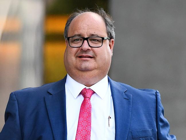 Clive Mensink, the nephew of Clive Palmer, leaves the Supreme Court in Brisbane, Wednesday, April 20, 2016. Mr Mensink Mr Mensink has asked the court to issue an injunction preventing the Queensland Nickel administrators from appointing receivers to three other Palmer nickel companies who were in a joint venture with QN. (AAP Image/Dave Hunt) NO ARCHIVING