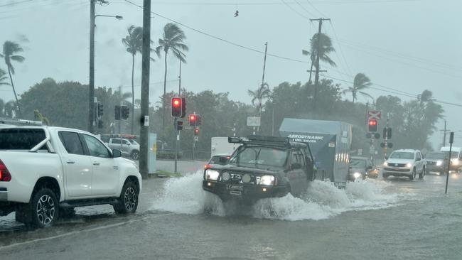 Heavy rain lashes Townsville causing flash flooding. Ingham Road and Cowley Street intersection. Picture: Evan Morgan