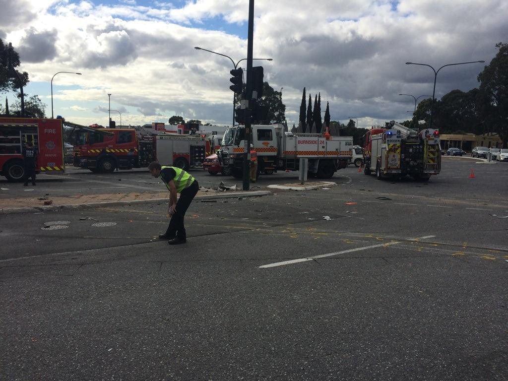 The wreckage of the crash is strewn across much of Cross Rd. Picture: Sam Kelton