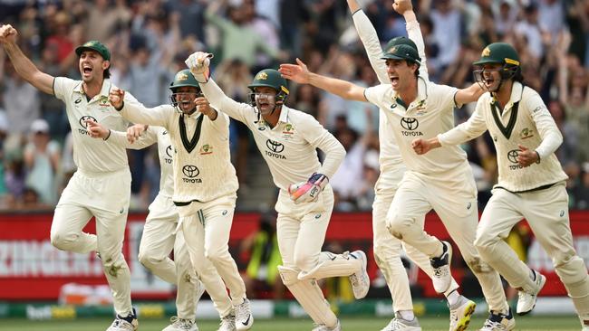 Australian players celebrate victory on Monday. Picture: Getty Images