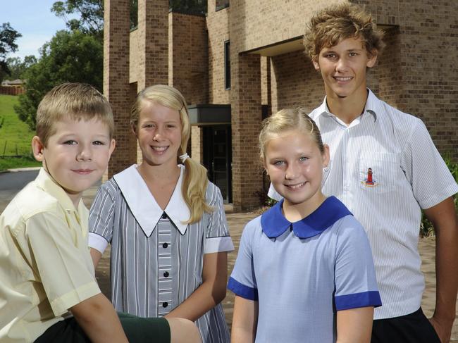 Catholic schools will return to normal attendance next week. File photo: students (L-R) Hayden Smith (St John Fisher), Bridget Brosnan (St Peters), Olivia Rowan, (Our Lady of the Rosary) and Jake Du Chateau (MacKillop College).