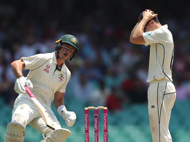 New Zealand’s Todd Astle reacts as Australia's Marnus Labuschagne runs between the wickets during a Sydney Test match in 2020. Picture: Brett Costello