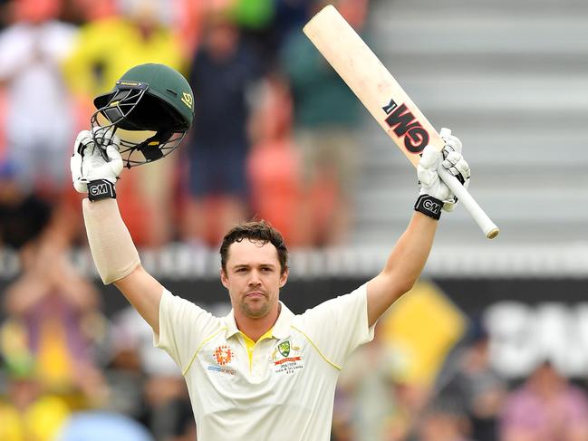 Australia's batsman Travis Head celebrates reaching his century (100 runs) during the first day of the second and final Test cricket match between Australia and Sri Lanka at the Manuka Oval in Canberra on February 1, 2019, (Photo by Saeed KHAN / AFP) / -- IMAGE RESTRICTED TO EDITORIAL USE - STRICTLY NO COMMERCIAL USE --