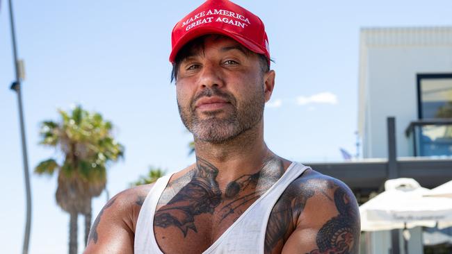 Ange was told by staff at Captain Baxter to remove his MAGA hat because it incited political trouble.Angelo has been a regular at the venue and was very disappointed. Pictured outside Captain Baxter St Kilda. Picture: Jason Edwards