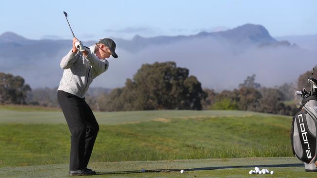 Greg Norman hits a few balls at the opening of the Cathedral Lodge golf course near Rollason. Saturday, Oct14. 2017. Picture: David Crosling