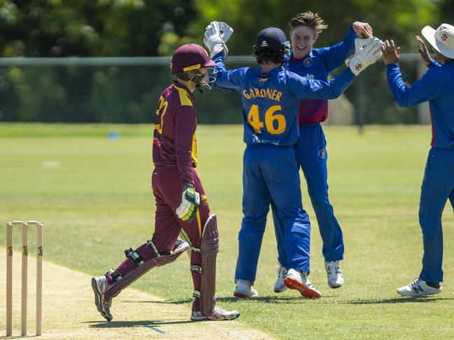 Heat spinner Bailen Clarke celebrates with keeper Mackenzie Gardner. Picture: Valeriu Campan