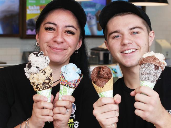 Ben & Jerry's Scoop in Surfers Paradise is going to give away free ice cream for the day on Monday, April 3. Staff members Ashleigh Joseph and Spencer Luetchford ready with the tasty treats, so better get yours before everyone else. Picture Glenn Hampson