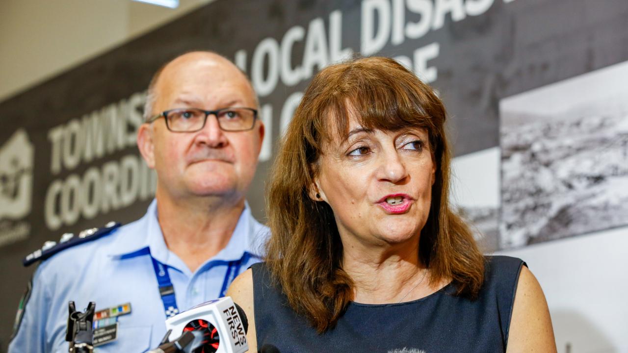 Townsville Mayor Jenny Hill (and Acting Chief Superintendent Steve Munro) address the media at the Disaster Management Centre, to update the state of flooding in Townsville yesterday. Picture: Michael Chambers