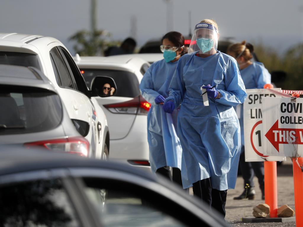 Long lines of people waiting for a COVID-19 test in Narellan after a local early learning centre was listed as an exposure site. Picture: Jonathan Ng