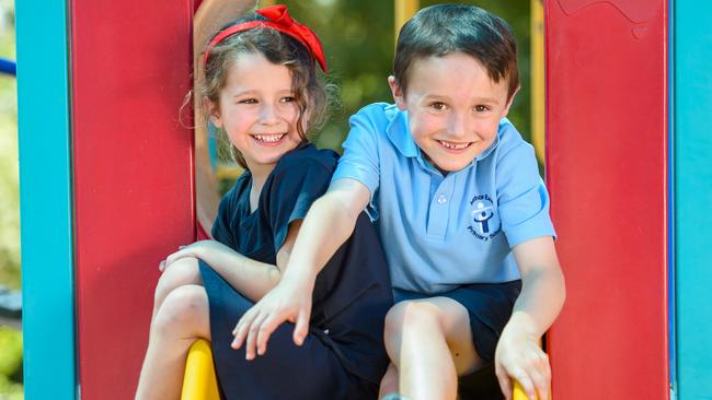 Charlie, 6, and Charli, 6, are back at school after lockdown. Picture: Jay Town