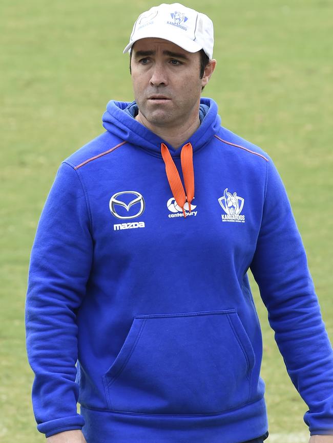 Coach Brad Scott sporting the new training kit for the Roos, featuring orange. Picture Andy Brownbill