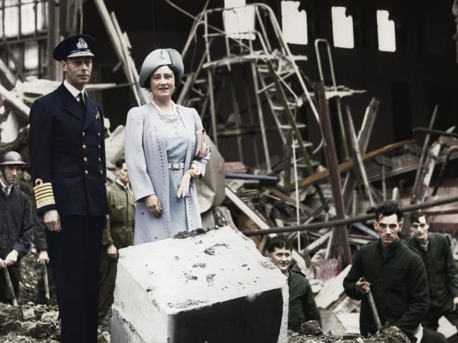 The King and Queen survey bomb damage, Buckingham Palace, London, WWII, 1940. King George VI and Queen Elizabeth looking at the aftermath of a German bombing raid on 11 September 1940 which destroyed the palace chapel. After the event the Queen famously said I'm glad we have been bombed. Now I can look the East End in the face. The palace was bombed on seven occasions during the war. (Colorised black and white print). Artist Unknown.. (Photo by The Print Collector/Getty Images)