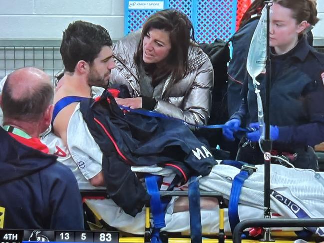 Christian Petracca on his way to hospital after an accidental knee in the ribs