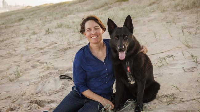 Dr Kirsty Wright and her German Shepherd Ava at Main Beach, Surfers Paradise. Picture: Glenn Hunt