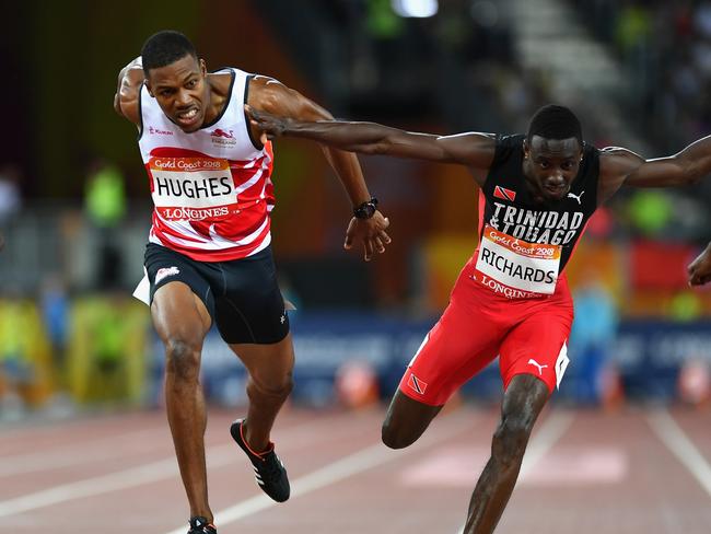 GOLD COAST, AUSTRALIA - APRIL 12:  Zharnel Hughes of England crosses the line to win gold ahead of Jereem Richards of Trinidad and Tobago inthe Men's 200 metres final during athletics on day eight of the Gold Coast 2018 Commonwealth Games at Carrara Stadium on April 12, 2018 on the Gold Coast, Australia.  (Photo by Dan Mullan/Getty Images)