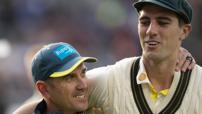 MANCHESTER, ENGLAND - SEPTEMBER 08: Australia Coach Justin Langer celebrates with bowler Pat Cummins during day five of the 4th Ashes Test Match between England and Australia at Old Trafford on September 08, 2019 in Manchester, England. (Photo by Visionhaus)