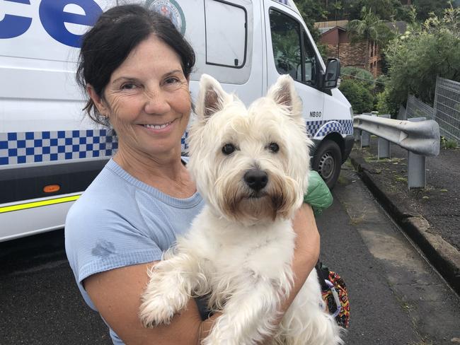 Newport resident Gina Hill, with her dog Wallace, who lives in Belinda Pl. She had an encounter with the dead man two years ago when she was bitten by his dog. Picture: Jim O'Rourke