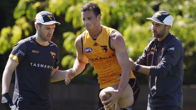 MELBOURNE , AUSTRALIA.February 15 , 2024.  AFL. Hawthorn Intraclub practise match at Waverley  Park.   James Blanck of the Hawks  is helped club staff after appearing to hurt his left knee during the clubs intra club hit out  . Pic: Michael Klein