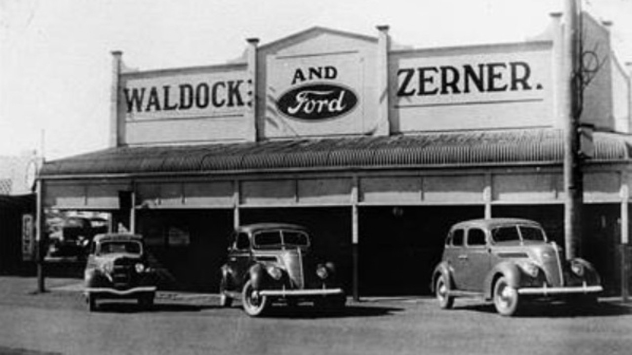 Cars outside Waldock and Zerner’s Ford dealership, Murgon, 1937. A scene of modern mobility and the dealership’s role in transforming regional transport. Source: QldPics